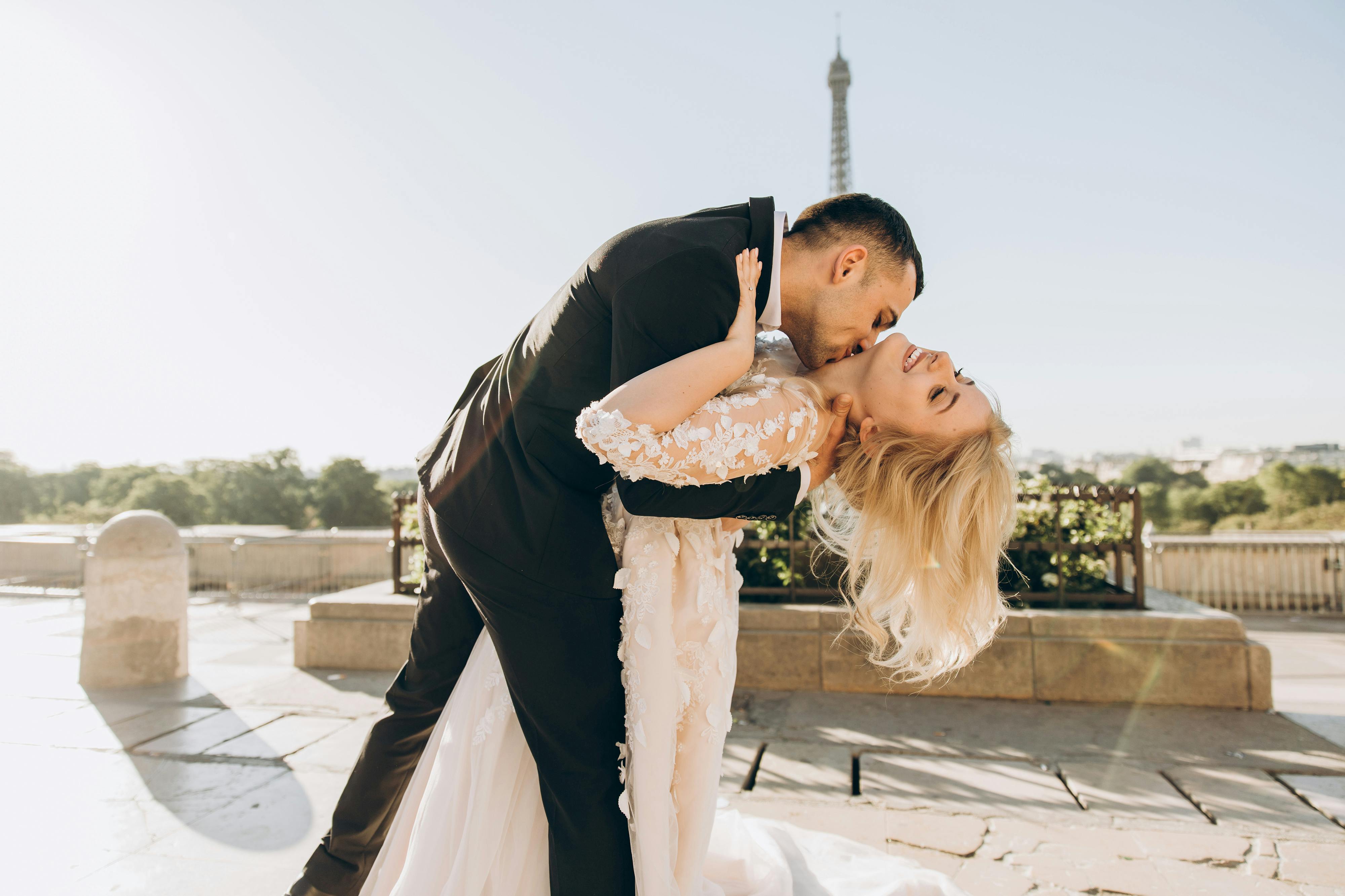 young couple bride and groom in a white short dress
