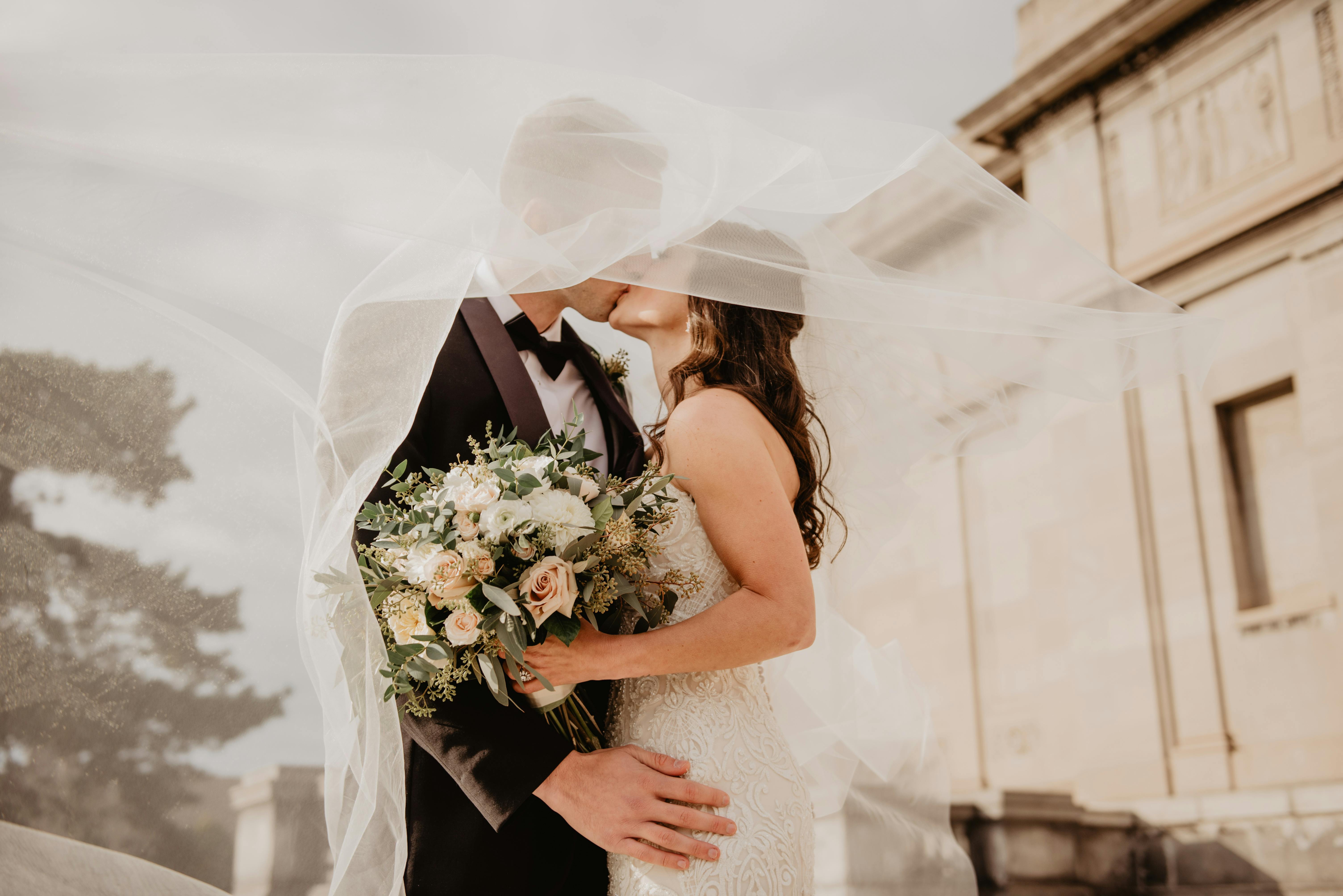 Emotional couple at wedding ceremony in christian catholic church